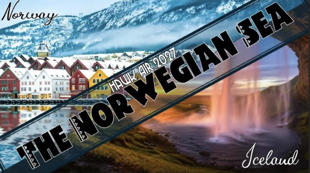 A scenic view of colorful buildings along a waterfront in Norway, with mountains in the background and a waterfall.
